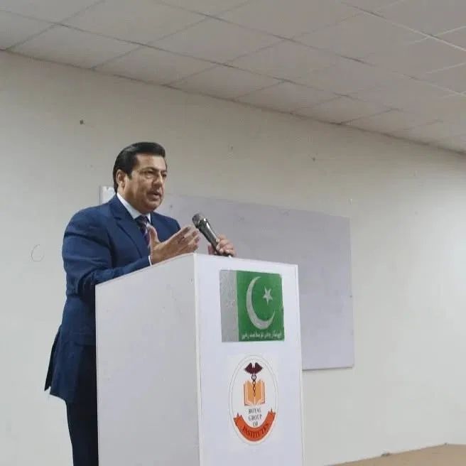 The CEO of Royal Institute speaking from a podium
