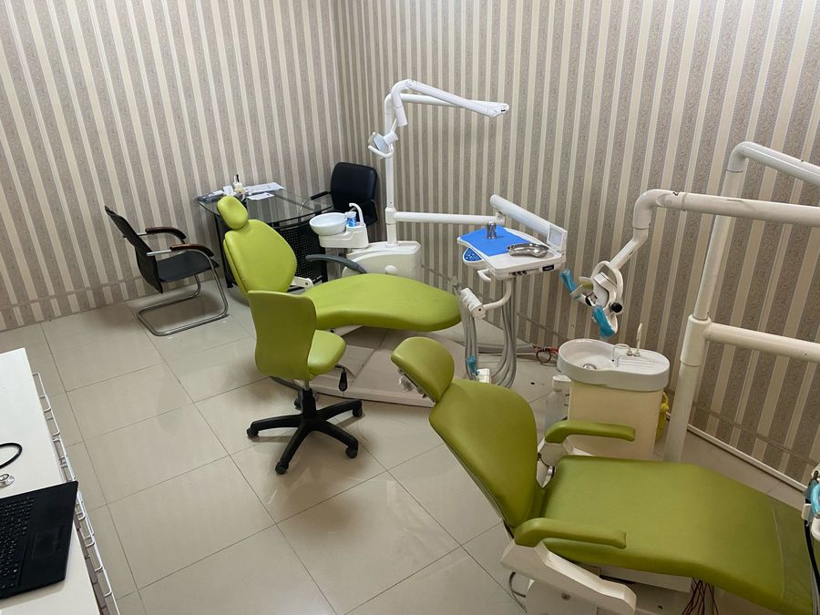 Clinical practice room with two dental chairs and instrument units