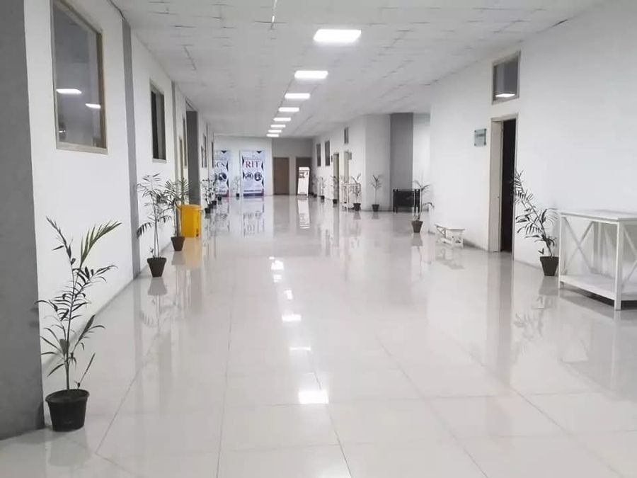 Teaching corridor with program banners at Royal Institute Lahore